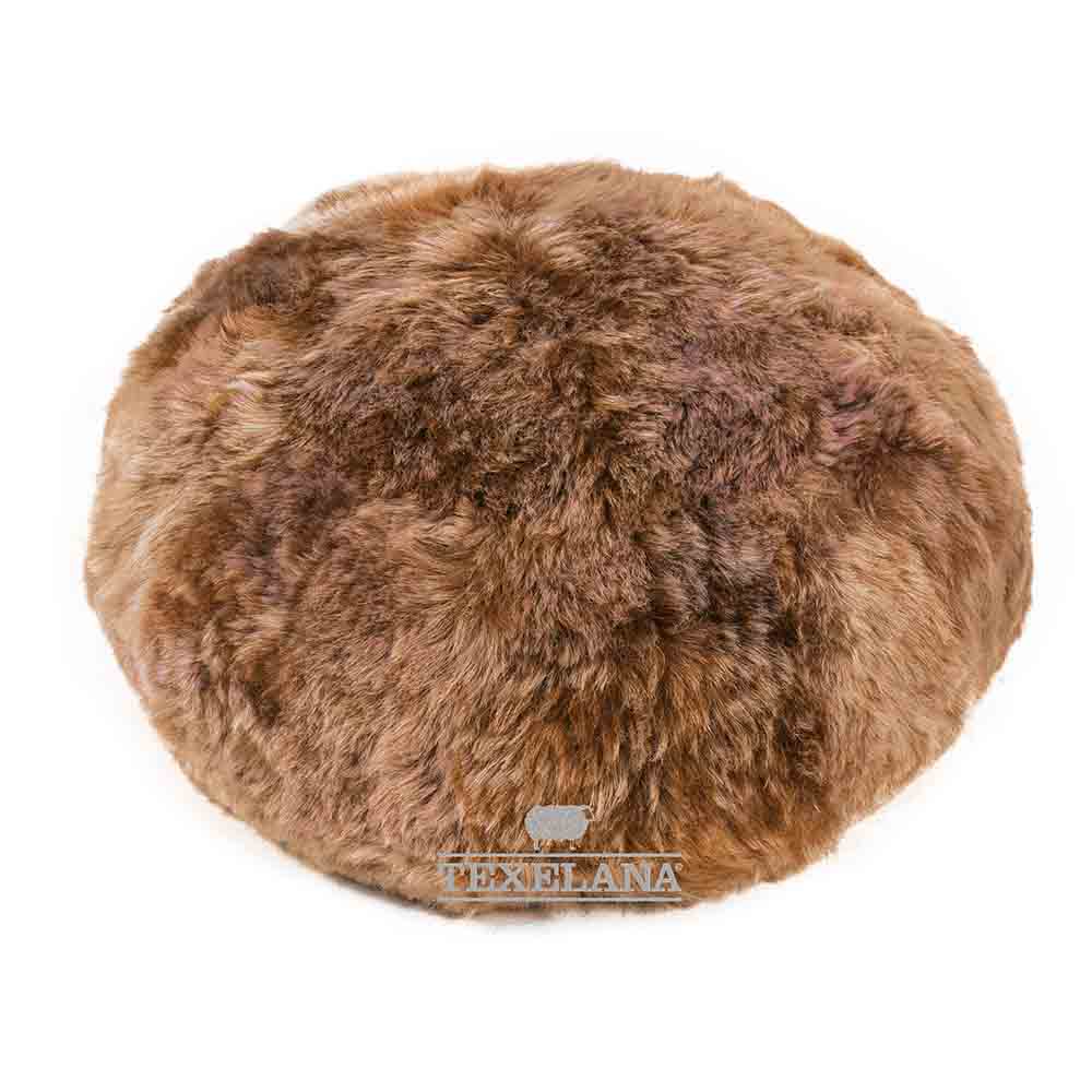 Texelana - pouffe of Texelana sheepskin | floor rust brown